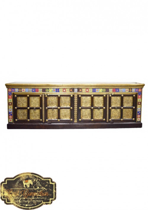 The furniture is beautifully fitted with hand pressed intricate detailed brass metal which gives it great character. Quality of craftsmanship can be seen in close up pictures. Features Hand painted ceramic tiles and two tone brass detail This surely is an eclectic piece of furniture. Would look stunning as a feature piece in any room.