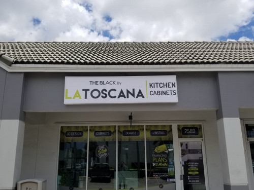 Exterior business signs for LA Toscana in Miami FL